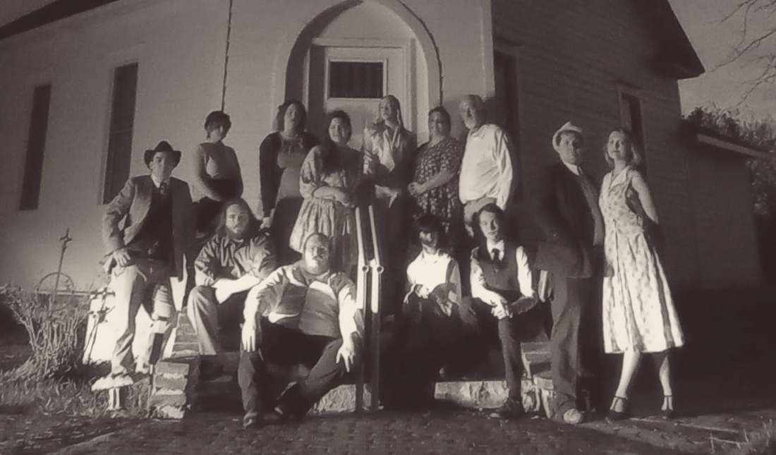 The Bonnie & Clyde company on the church steps, closer view (black and white)