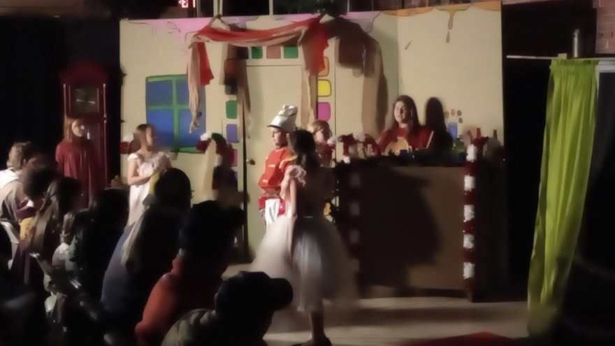 A closer view of Clara turning toward the audience during the counter scene